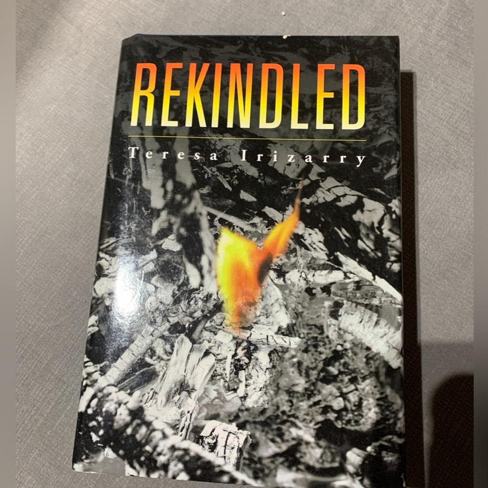 Rekindled By Teresa Irizarry Hard Cover Book
